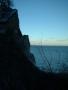 Klippe, og solen i ferd med � g� ned